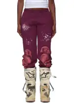 Comfortable nocturnal highway sweatpants with artistic paint splatters and bold design. Perfect for.