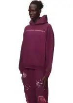 Hoodie with "Nocturnal Highway" text in purple, perfect for streetwear style.