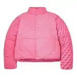 Pink puffer jacket with textured and patterned design, stylish and warm for winter.