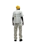 Man wearing Sp5derworlwide anniversary graphic T-shirt, back view.