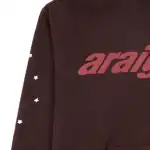 Hoodie featuring "araignée" logo with spider design, perfect for streetwear fans.