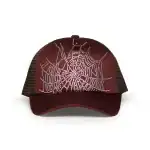 Brown trucker cap with spider web design and rhinestone accents.
