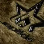 Close-up of Sp5der logo on nocturnal animal-inspired jacket with faux fur texture.
