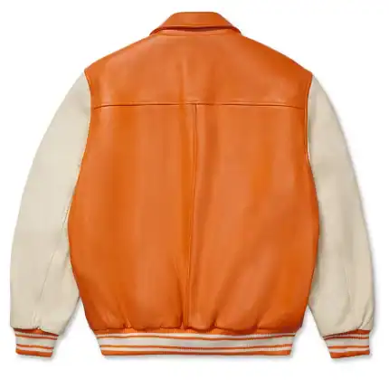 Orange leather varsity jacket with cream sleeves and striped cuffs, stylish and trendy for streetwea.