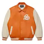 Orange leather varsity jacket with white sleeves and logo.