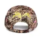 Camouflage baseball cap with yellow Sp5der logo and pink accents, outdoor style.
