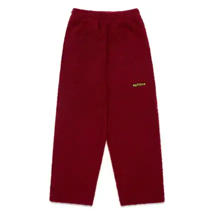 Comfortable red fleece pants for kids by Sp5der. Perfect for cozy loungewear and casual wear.
