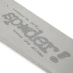 Close-up of Sp5derworlwide logo on Tonal Punk V2 Sweatpant fabric.