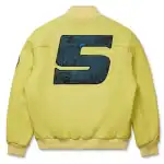 Yellow leather bomber jacket with a large blue spider web "S" logo on the back.