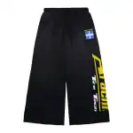 Comfortable black sweatpants with bold yellow and white branding, perfect for casual wear and sports.